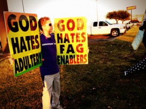 Little boy, Noah, protesting with Westboro Baptist Church in Texas photo Westboro website