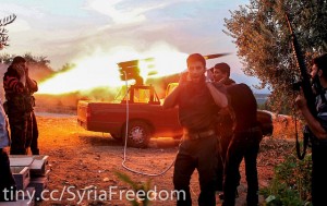 Syrian rebels firing missiles at government soldiers photo FreedomHouse via Flickr