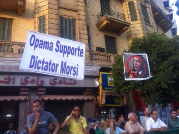 Anti Obama protest signs Egypt