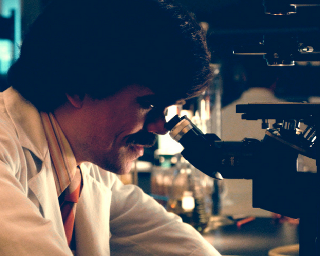 Peter Dinklage Trask at microscope