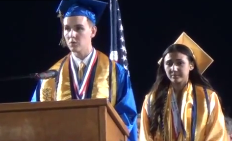Brooks Hamby delivering graduation speech, including references to God and Jesus Christ  photo/screenshot YouTube