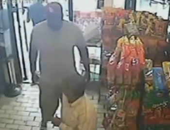 Michael Brown robbing a store minutes before being fatally killed by police  photo/screenshot of video