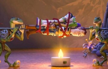 toy-story-that-time-forgot-still Buzz and Woody on stick over fire