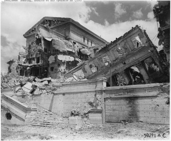 Complete demolition of the Legislature Building in Manila, P.I. One of the finest government buildings in the Far East, it was the pride of the Philippine Government. Filipino citizens pass the building and look in abject wonderment at the results of total war.  photo/ Department of Defense. Department of the Army. Fort Leavenworth, Kansas 1945