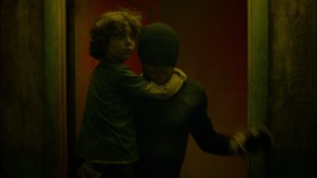 Charlie Cox saving child in Netflix series Daredevil