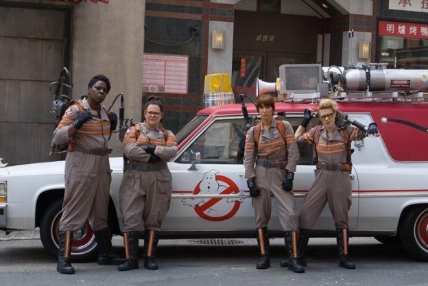 Ghostbusters cast photo in front of Ecto 1