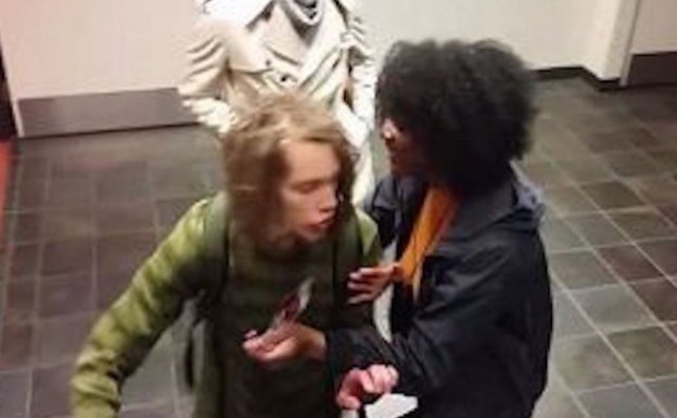 screenshot video white student with dreadlocks being confronted, called racist