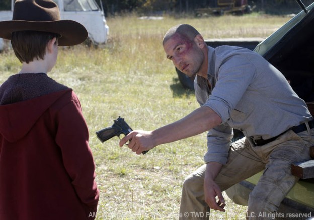 Jon Bernthal  from "The Walking Dead"  season 2 photo Shane giving Carl a gun photo/AMC