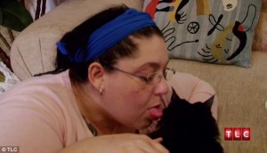 Cat licking woman Strange Addictions TLC photo