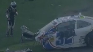 Kyle Larson next to the remains of his car after the Daytona 500 crash screenshot NASCAR.com video