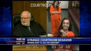 Miami court woman flips off Judge
