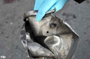 This file image from a Federal Bureau of Investigation and Department of Homeland Security joint bulletin, shows the remains of a pressure cooker that the FBI says was part of one of the bombs that exploded during the Boston Marathon