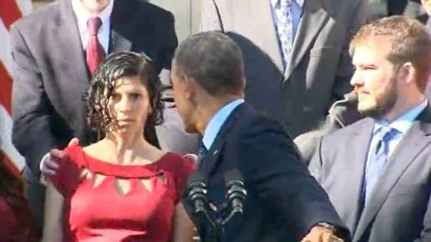 Obama red dress woman faint during speech