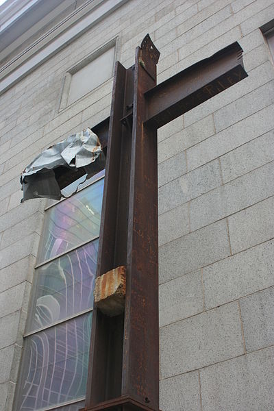 The World Trade Center cross, also known as the Ground Zero cross, found amidst the debris of the World Trade Center following the September 11, 2001 attacks which resembles the proportions of a Christian cross. As it stands in 2008 at St. Peter's Church, which faces the World Trade Center site.  photo by Ben Franske via wikimedia commons