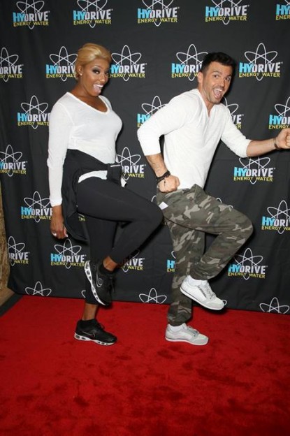 Real Housewives of Atlanta’s Nene Leakes goofs off with hunky dance partner Tony Dovolani backstage to shake off the nerves before the Dancing with the Stars premiere last Monday. photos courtesy HYDRIVE Energy Water