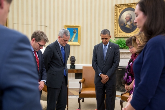 President Barack Obama observes a moment of silence during his meeting with senior advisors in the Oval Office at 2:49 P.M. to mark the one-year anniversary of the Boston Marathon bombings, April 15, 2014. Pictured from left, are Senior Advisor Dan Pfeiffer, Press Secretary Jay Carney, Chief of Staff Denis McDonough, Senior Advisor Valerie Jarrett, Communications Director Jennifer Palmieri, and Katie Beirne Fallon, Director of Legislative Affairs. (Official White House Photo by Pete Souza)  .