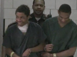 Murder suspect Simeon Adams was all laughts as he entered court on Thursday  photo is a screenshot of the coverage by WXIN