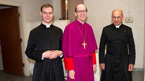 Father Kenneth Walker, 29, and Father Joseph Terra, 56, with Bishop Thomas Olmstead (right) in May. photo/Catholic Online