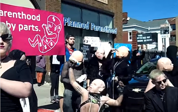 Satanists protesting a pro-life rally photo/ screenshot YouTube coverage