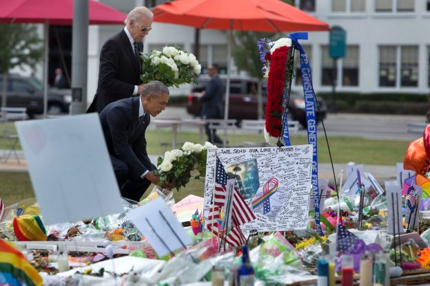 President Barack Obama and Vice President Joe Biden place bouquets of flowers at a memorial for the victims of the terrorist attack at the Pulse nightclub, at the Dr. Phillips Center for the Performing Arts in Orlando, Fla., June 16, 2016. (Official White House Photo by David Lienemann)